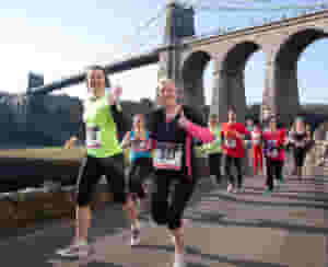 The most beautiful half marathon in North Wales! Flanked by breathtaking views of (Snowdonia) and the Menai Straits, the beauty and uniqueness of this event is what draws people from all over the UK!