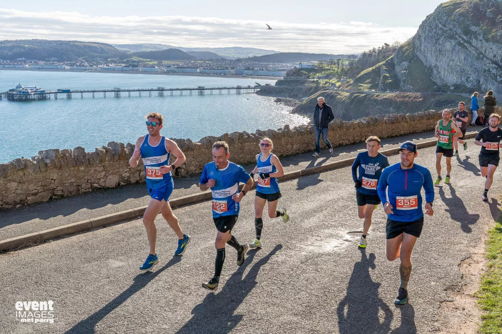 A scenic circuit of the Great Orme. Race the famous seaside course with rolling hills, bracing sea air and crowds, earning a pint at the finish after a fast, unforgettable winter challenge.