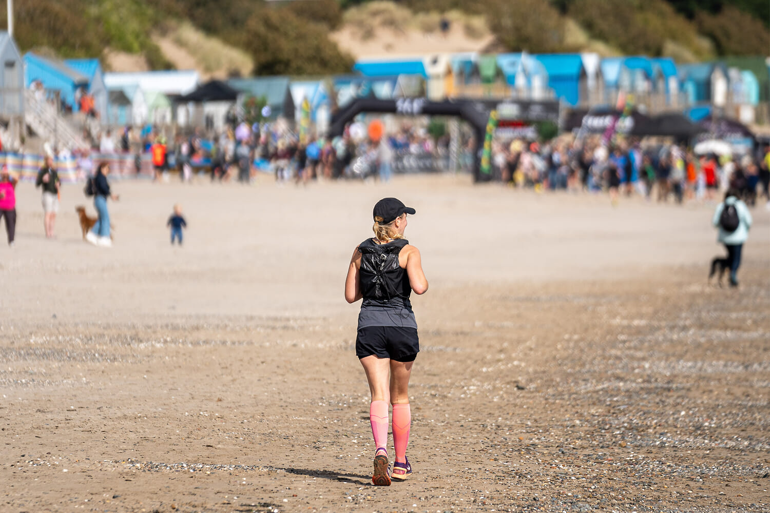 Abersoch Trail runner on beach 2 by Sam Beaumont