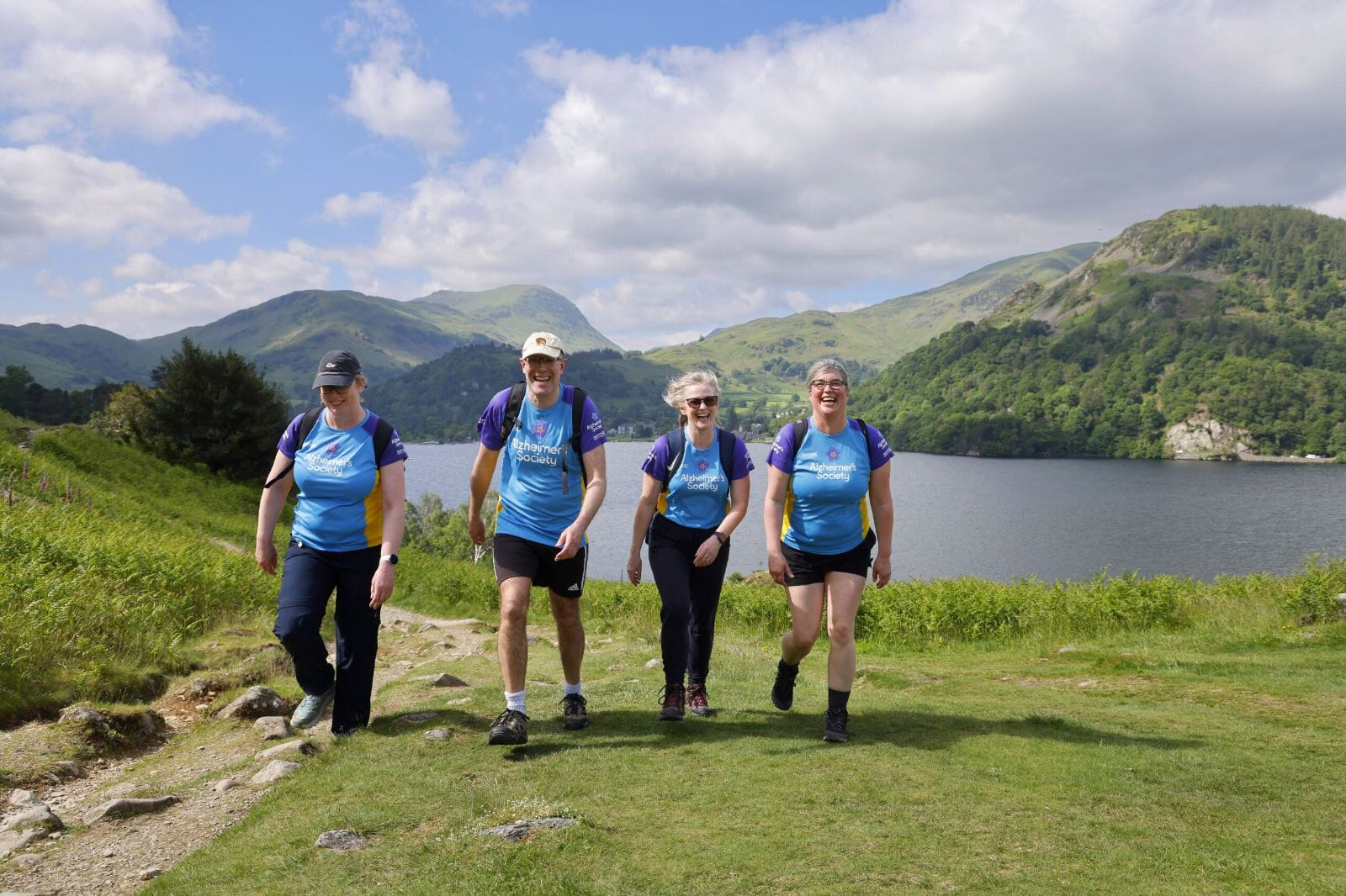 Trek 26 miles for Alzheimer's Society to beat dementia. Experience the beauty of Ullswater Lake, surrounded by towering fells and the powerful Aira Force waterfall. Every step is life-changing.