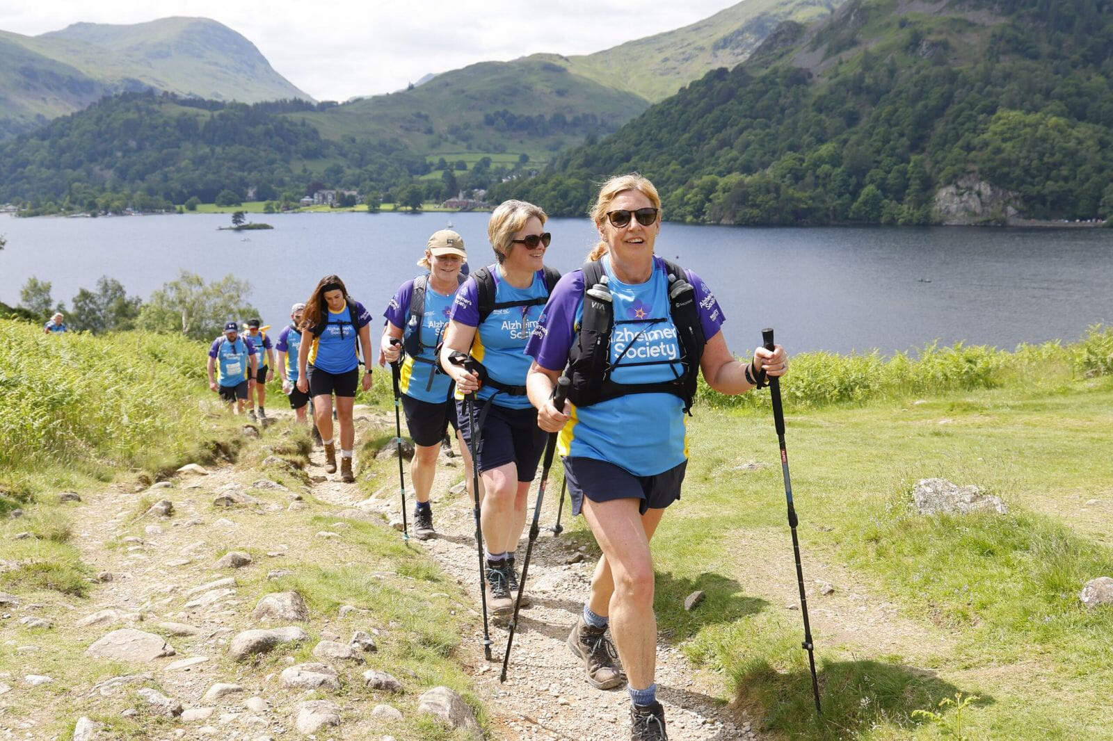 Trek for Alzheimer's Society to beat dementia. Experience the beauty of Ullswater Lake, surrounded by towering fells and the powerful Aira Force waterfall. Every step is life-changing.