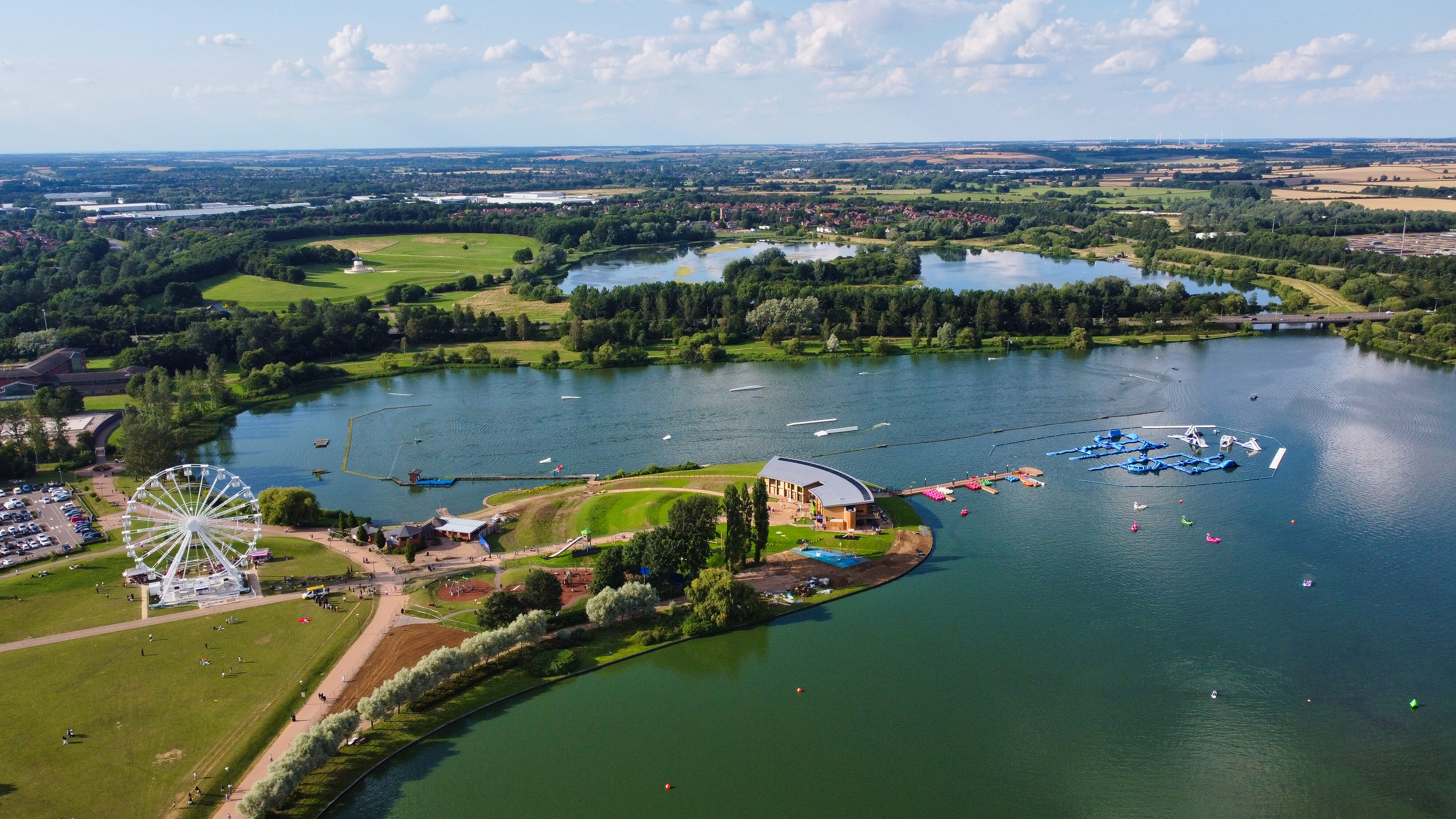 Swim in calm open water at Willen Lake, cycle a fully closed traffic-free road course, then run a flat scenic lakeside route less than an hour from London, Birmingham and Oxford.