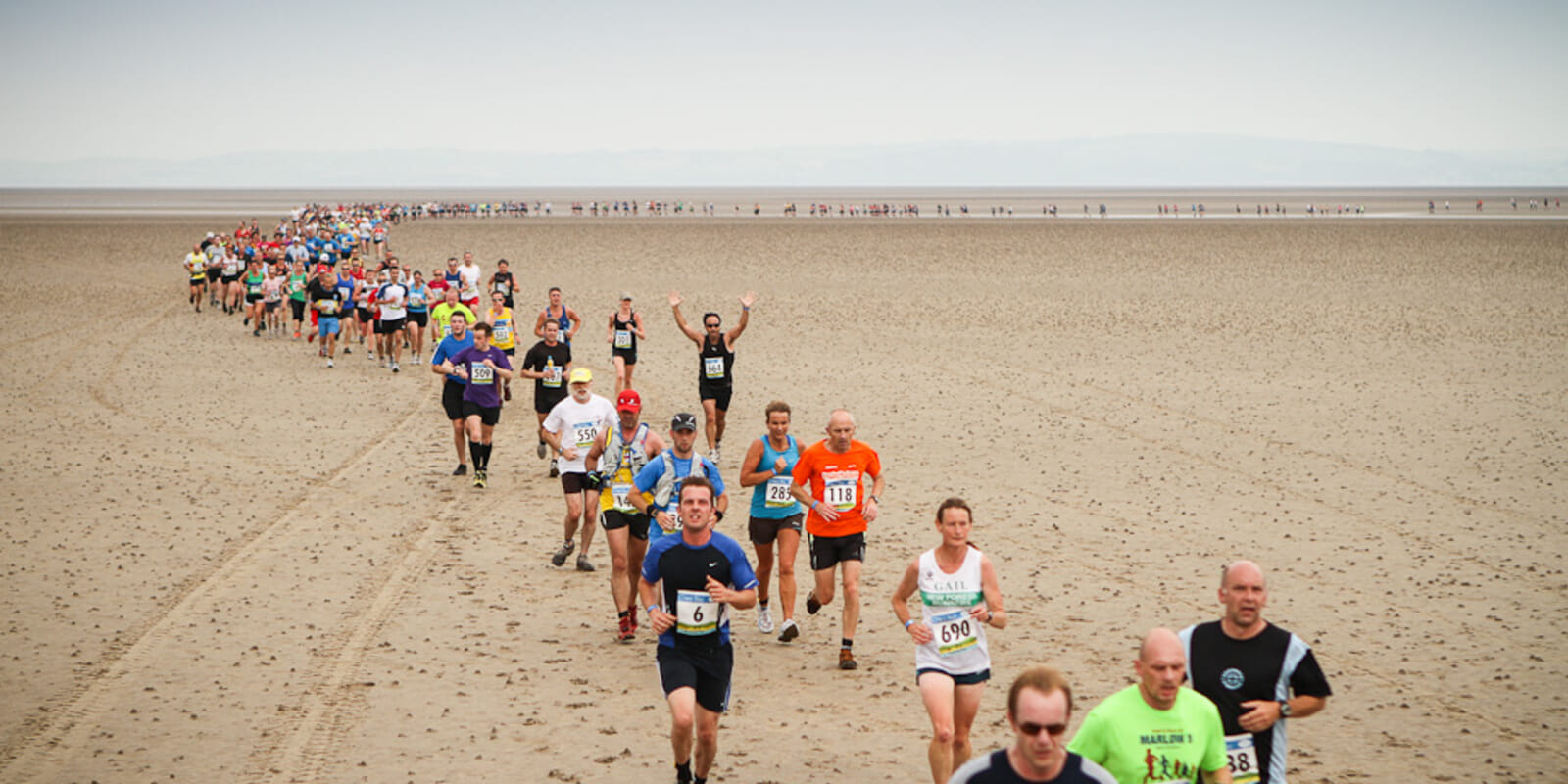 The only half marathon in the world that crosses a tidal bay! Rare chance to run across the iconic sands of Morecambe Bay guided safely by two experts in tractors at the front and back of the field.