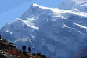 silhouette of hikers in annapurnas ii 48