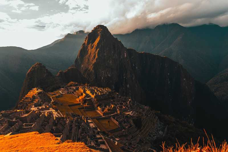 machu picchu bathed in orange light 785