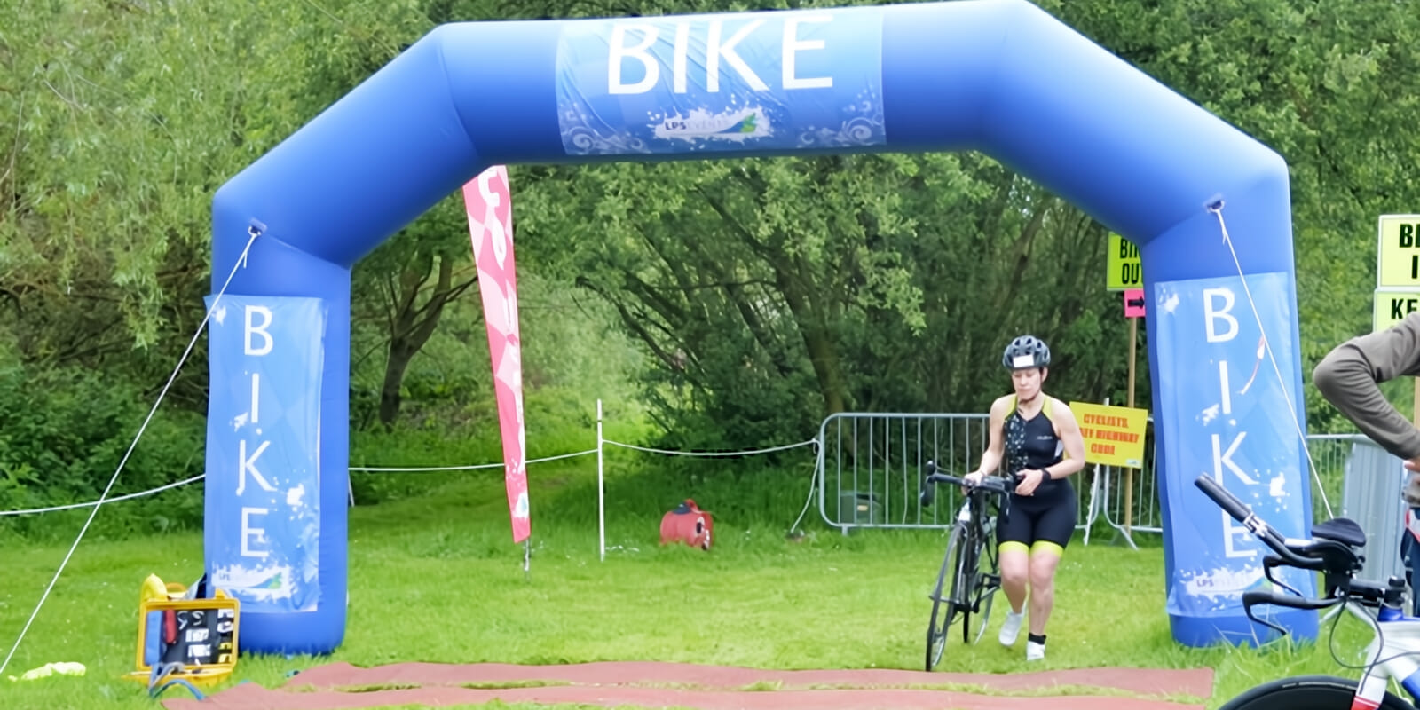 Swim in a private Cotswolds lake, ride scenic country roads and run within an exclusive venue at this family-friendly multisport spring event.