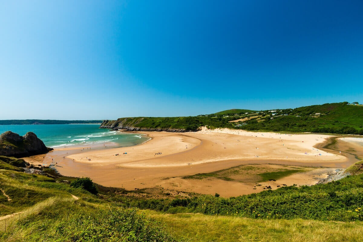 A classic distance from Penrice Castle on a loop featuring Oxwich Bay and its nature reserve, the stunning Wales Coast Path, picnic at Rhossili, the Gower Way then a celebration and medal!