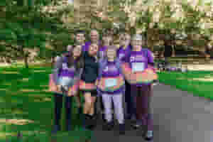 A group of participants in fancy dress at the Ovarian Cancer Walk Run London 2023