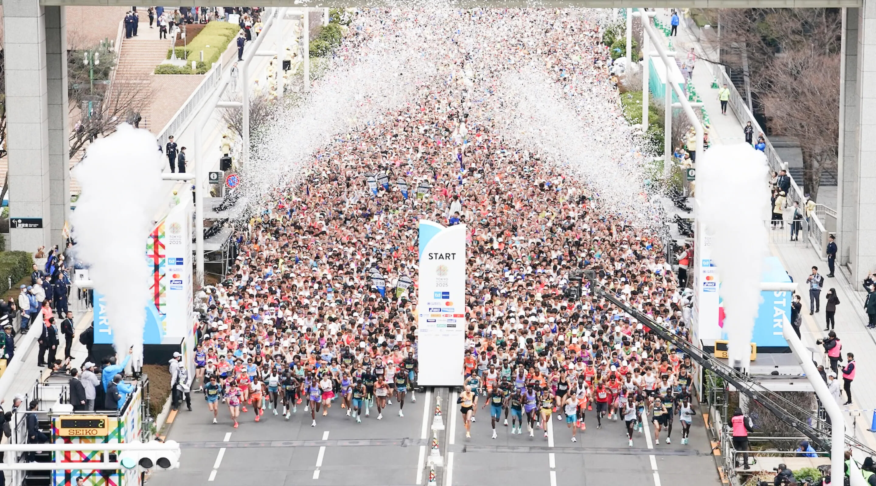 The streets of Tokyo transformed once more; a 20th milestone edition uniting elite athletes, aerobatic skies, and a city that runs as one.