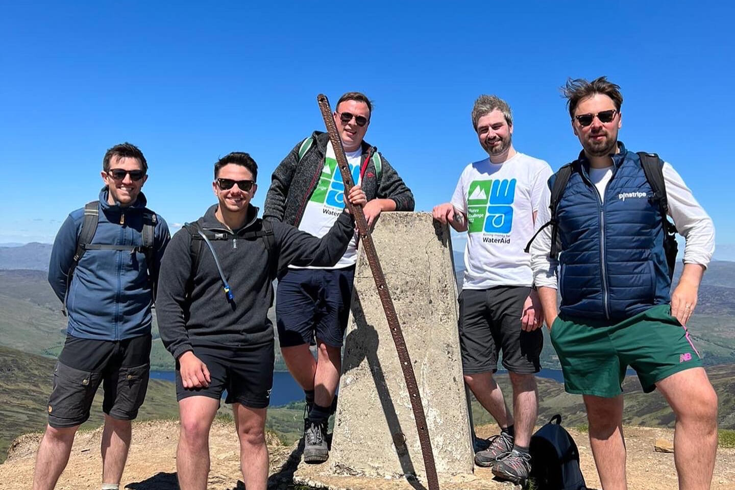 Friends and colleagues conquering a Munro together